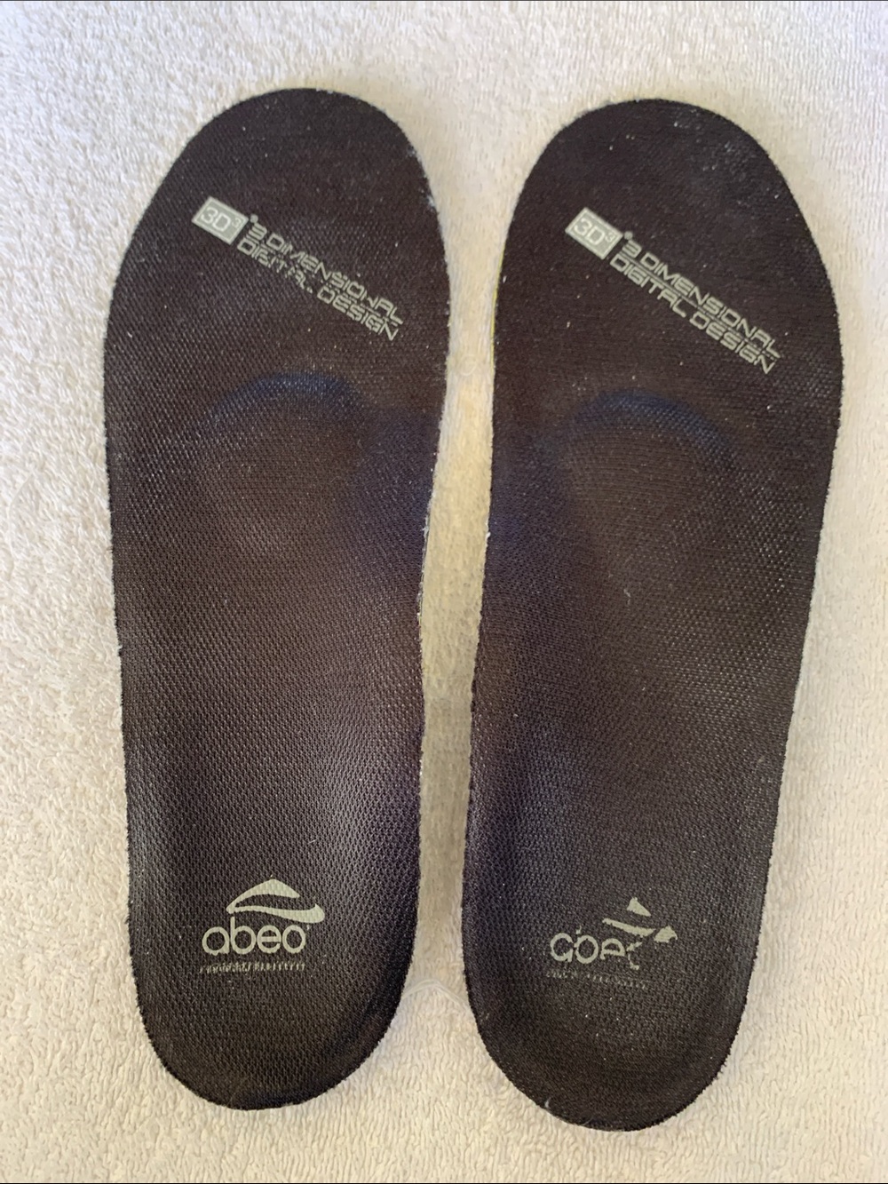 Woman’s aebo insoles for metatarsal support.